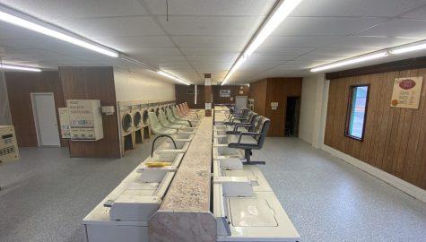 Laundromat with installed concrete floor coatings