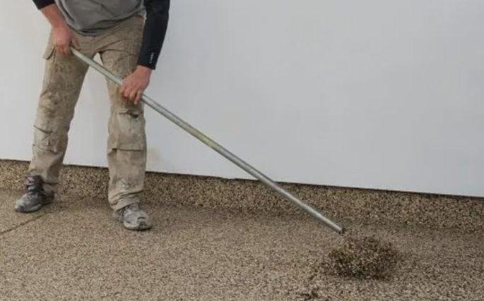 scraping paint chip flake off epoxy floor during installation